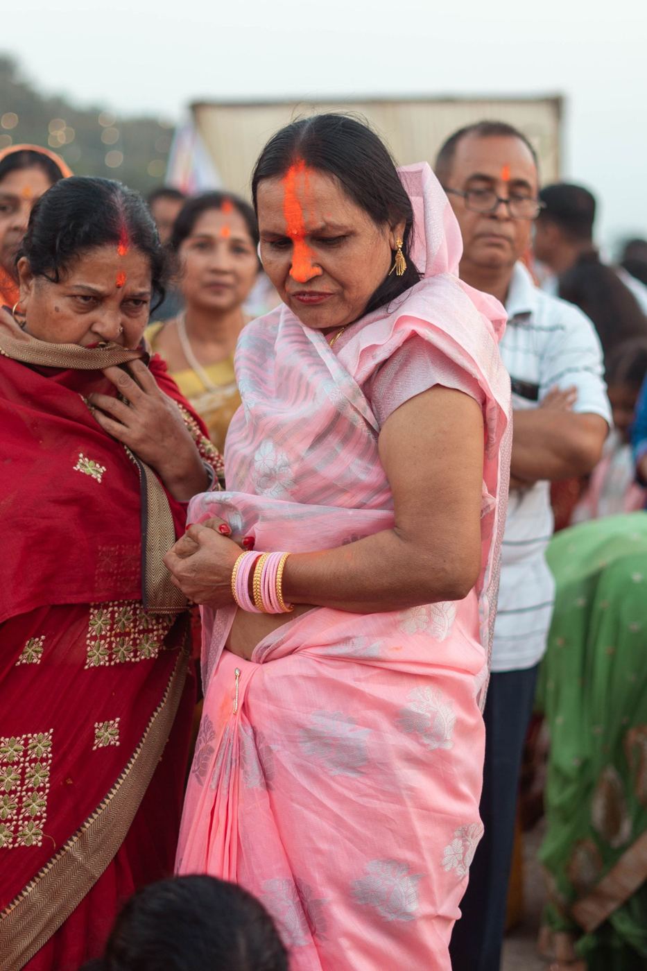 Women gathered at a community meeting